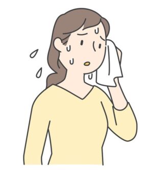 汗かく女性