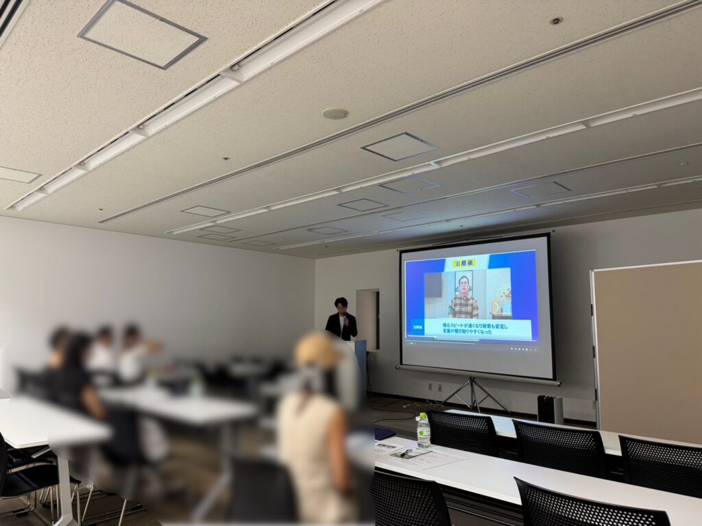 再生医療セミナーでスライドを用いて説明する様子